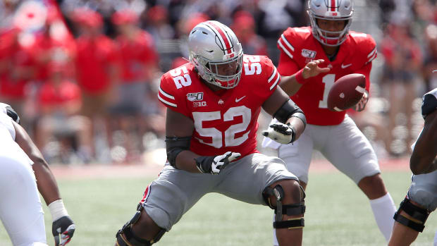 Ohio State All-American guard Wyatt Davis blocks for Justin Fields